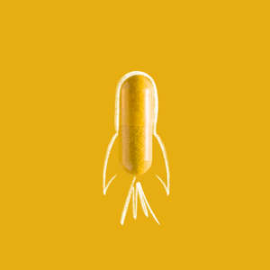 Illustration of a golden capsule resembling a rocket with spark trails on a vibrant yellow background, highlighting the concept of CoQ10 100mg supplements for energy.