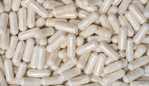 Heap of Boswellia supplement capsules, frequently used for their anti-inflammatory properties and support for joint and respiratory health.